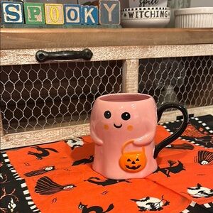 Lang 2024 Pink Ghost Halloween Mug holding Jack-O-Lantern Pumpkin